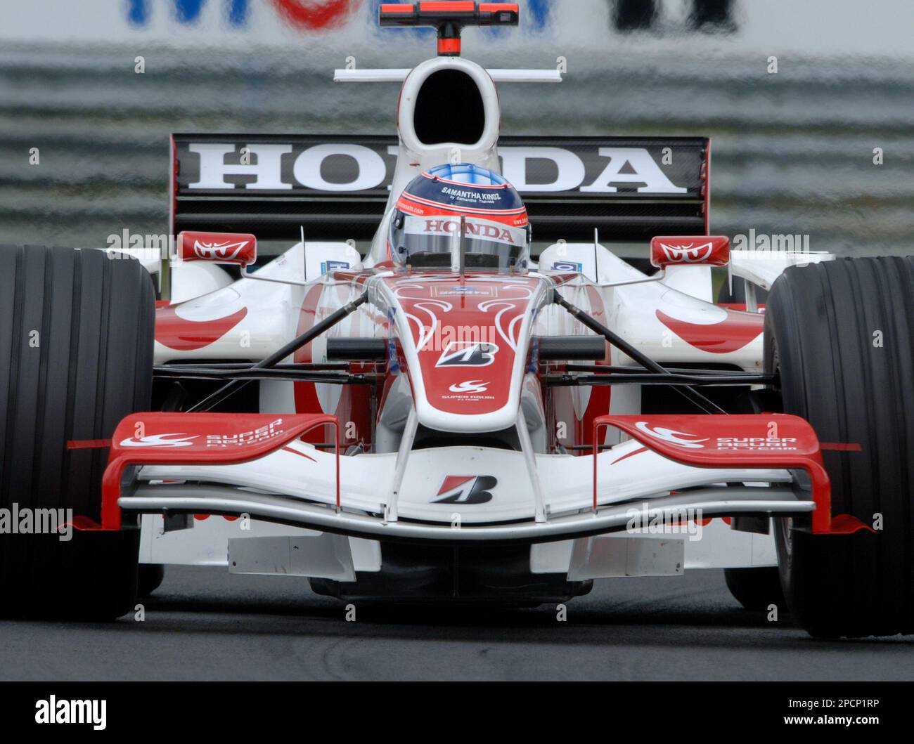 Japan's Takuma Sato steers his Super Aguri during the