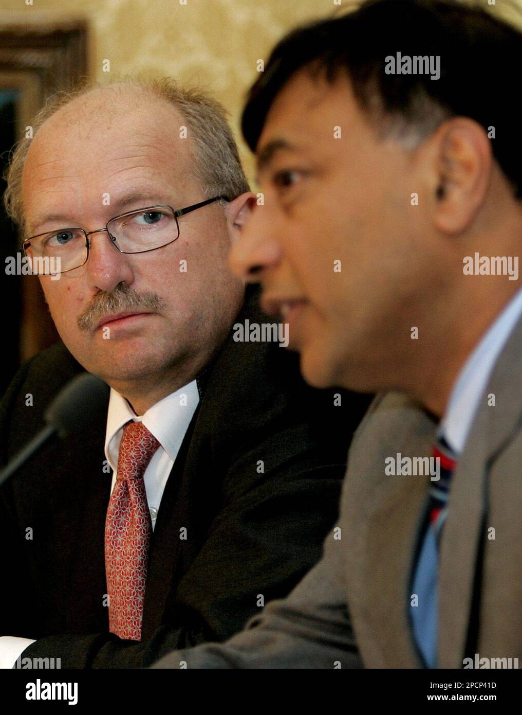 FILE ** Mittal Steel President Aditya Mittal, left, and Chief Executive  Officer Lakshmi Mittal, right, are seen at the start of a media conference  in Rotterdam, the Netherlands, in this Tuesday