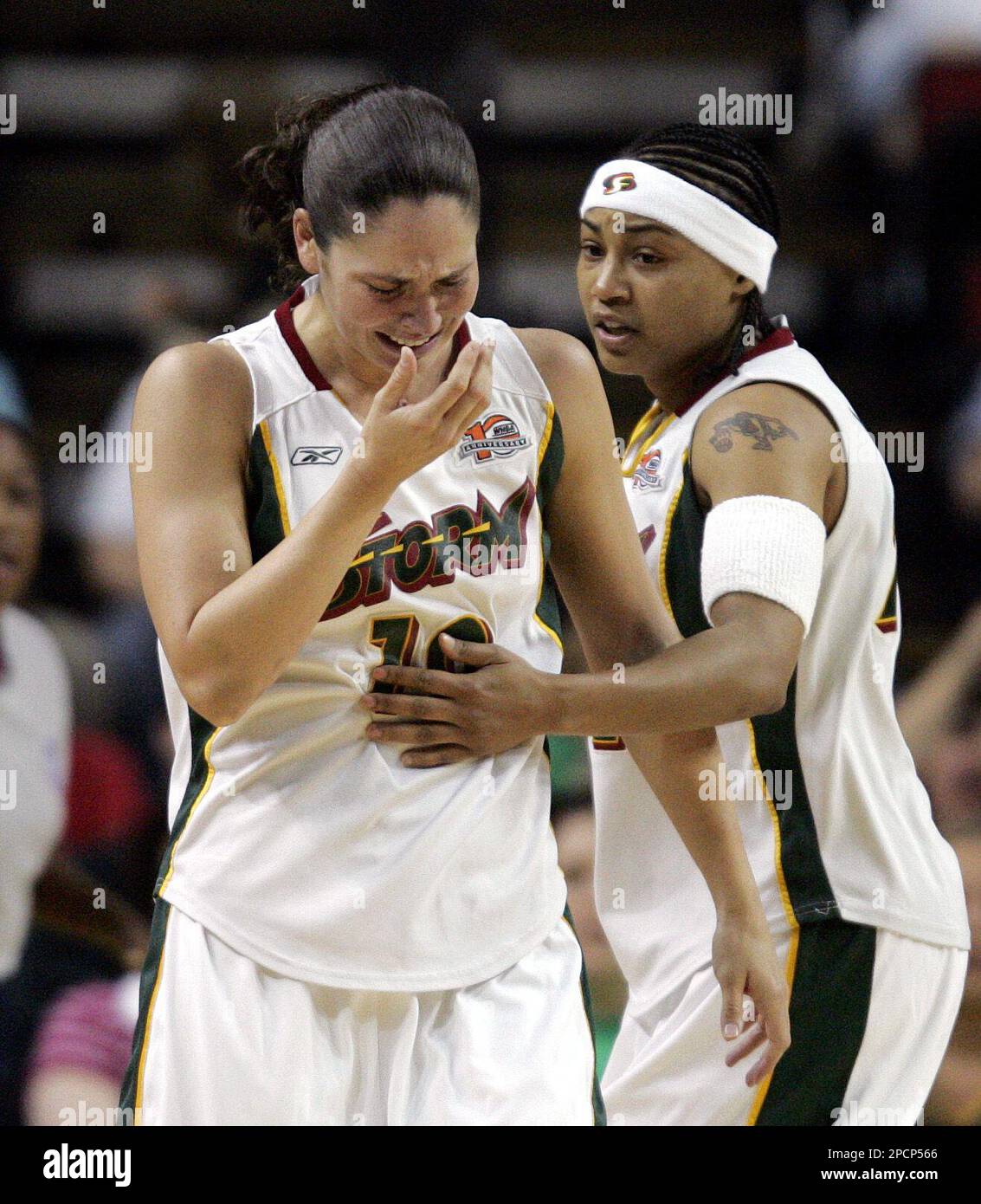 Seattle Storm's Betty Lennox, right, checks on teammate Sue