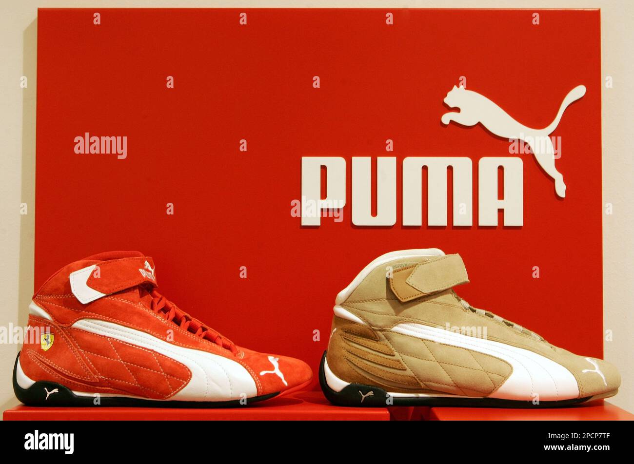 FILE Shoes by the German sportswear Puma are on display during a balance news conference in Nuremberg on Feb. 10, 2006. Puma AG said Thursday, Aug. 3, 2006 that