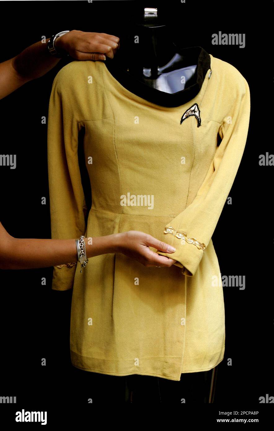 Zoe Schoon from Christie's auction rooms, London, arranges a mustard