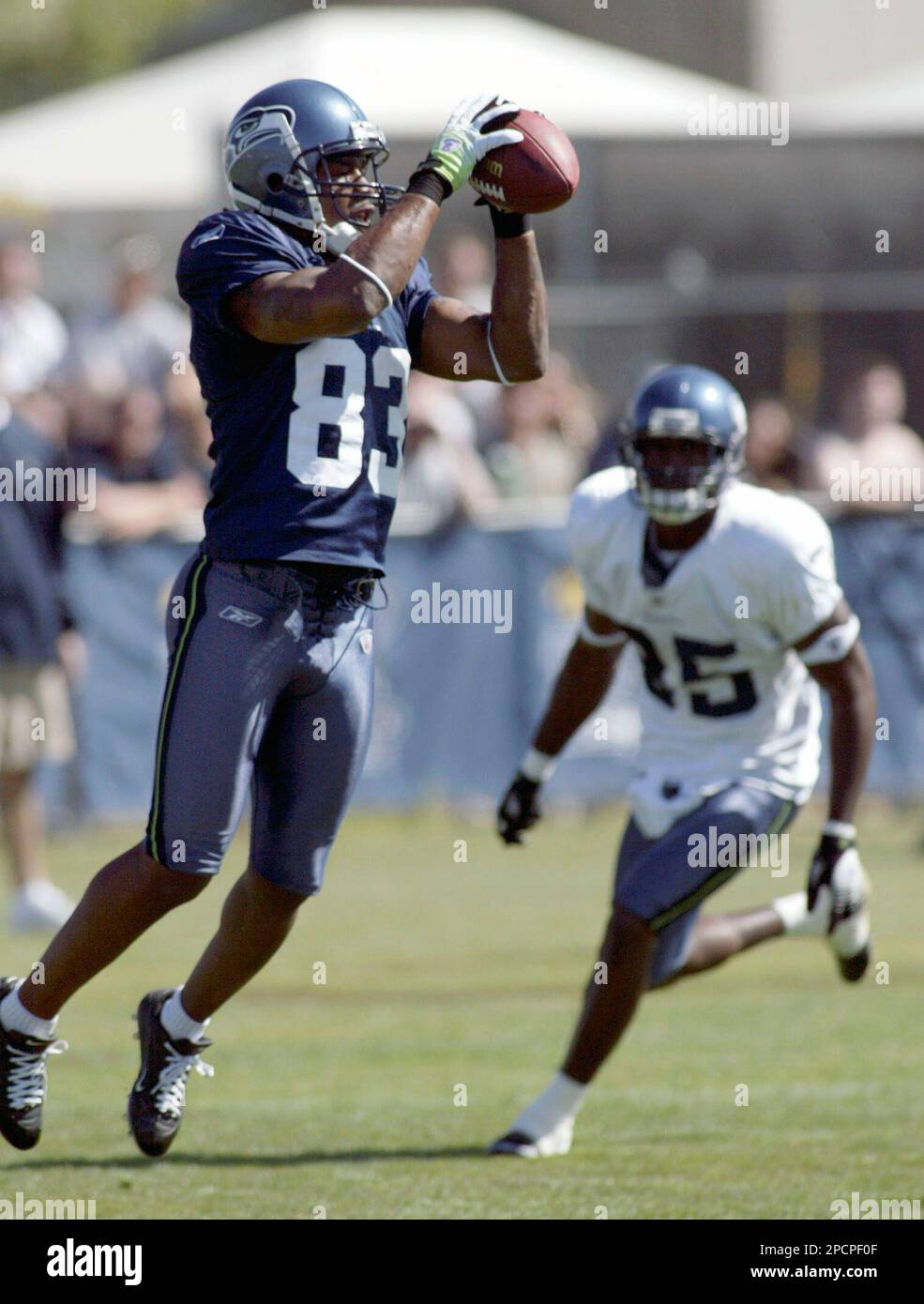 Seattle Seahawks cornerback Coby Bryant (8) defends down the field