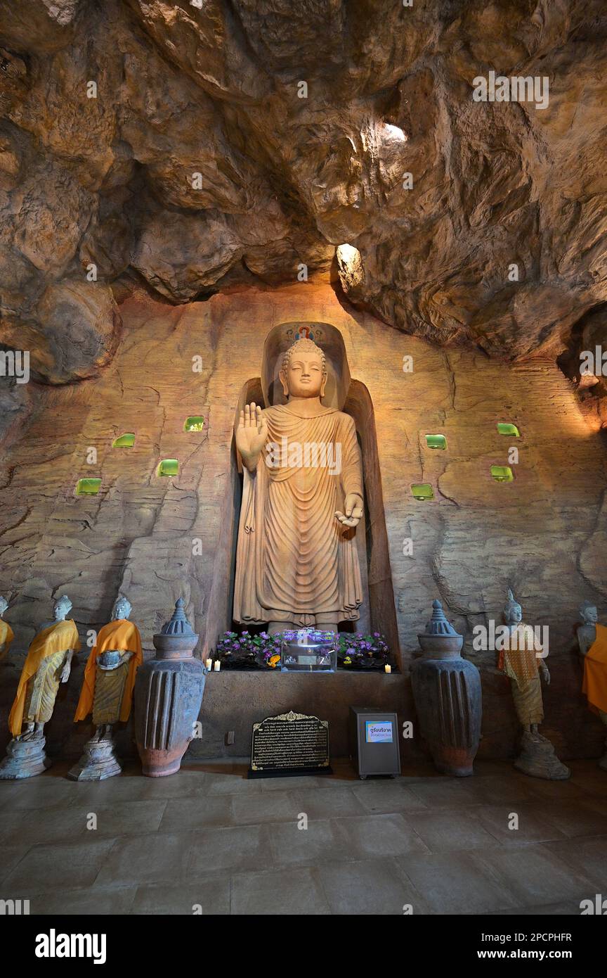 Front view of Afghan Bamiyan Buddha replica in custom-made grotto at the foot of the Golden Mount, Wat Saket, Bangkok Stock Photo