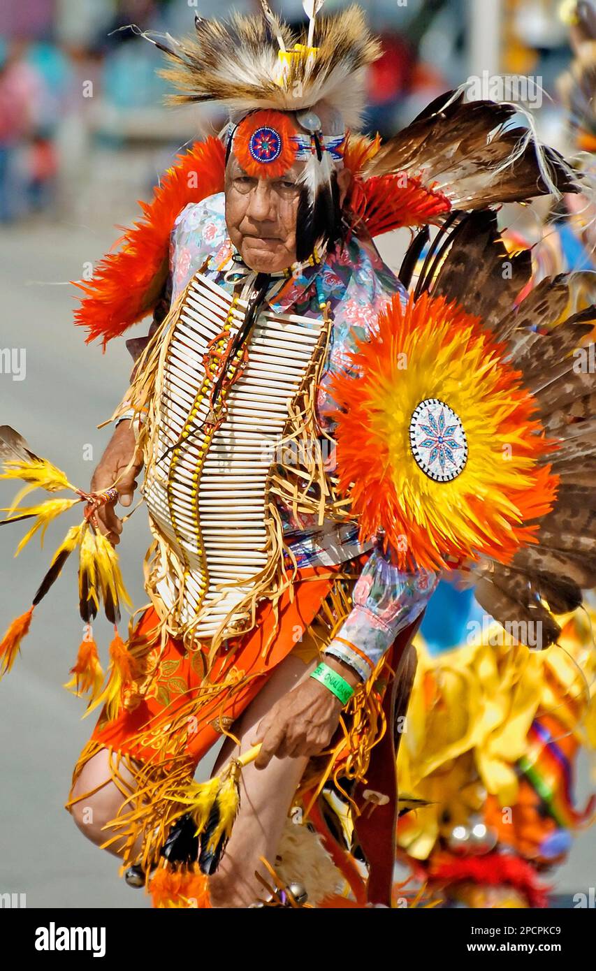 A Comanche dancer from Oklahoma begins to spin during their performance ...