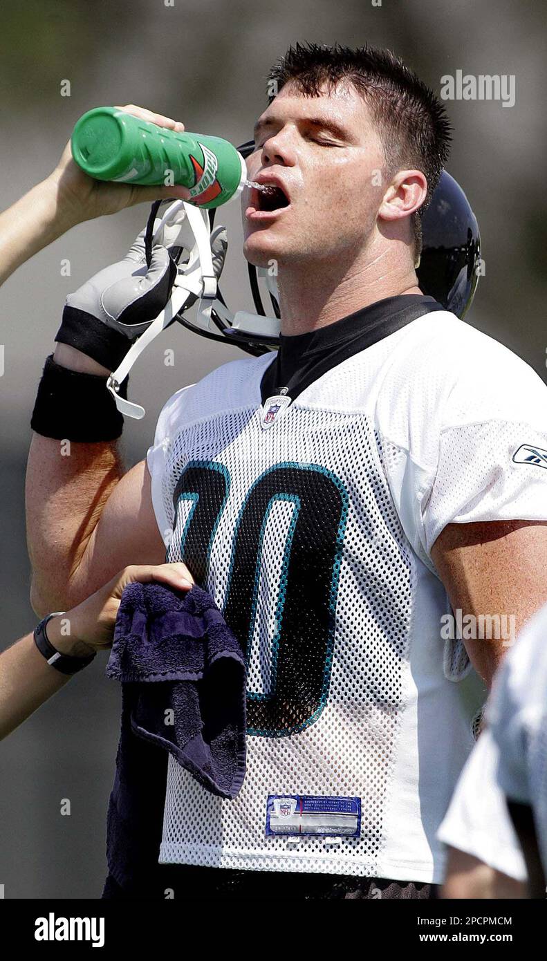 Jacksonville Jaguars tight end Kyle Brady gets a cool drink during