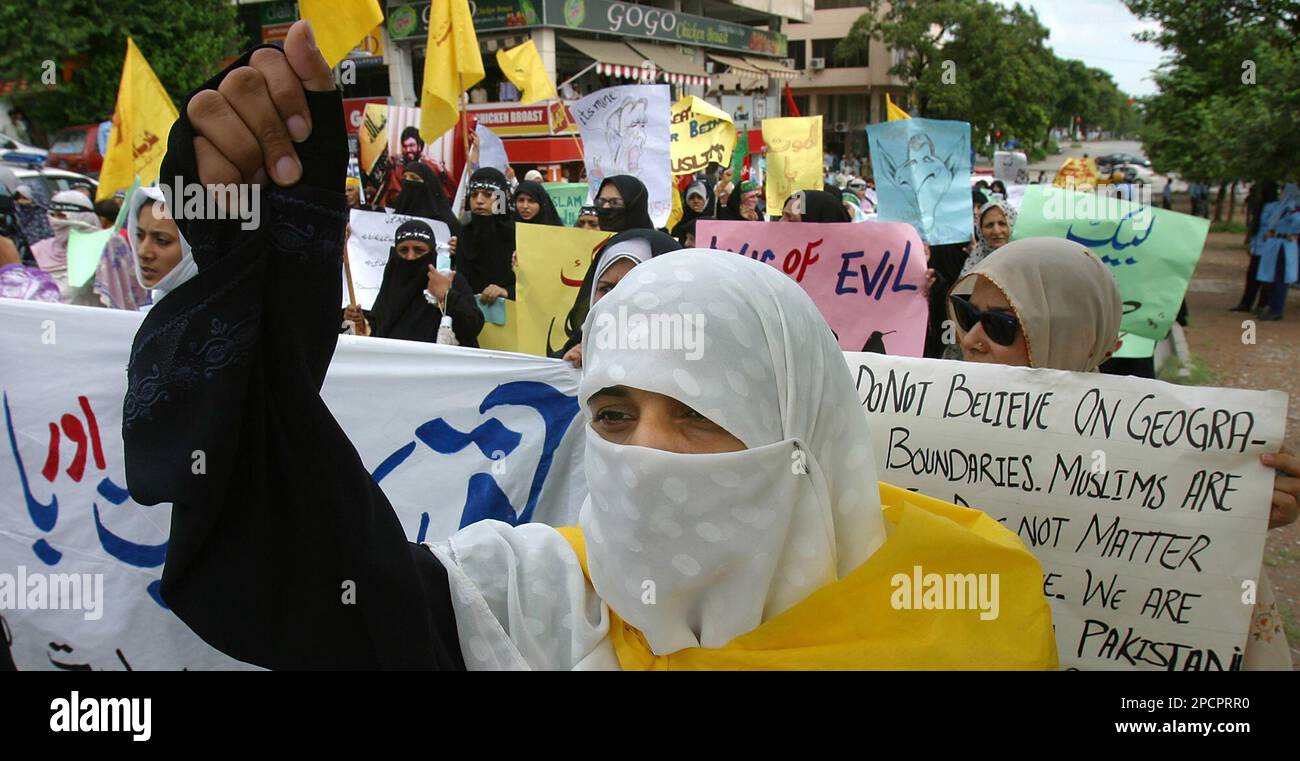 A Pakistani Shiite Muslim woman shouts anti-Israeli slogans at a rally ...