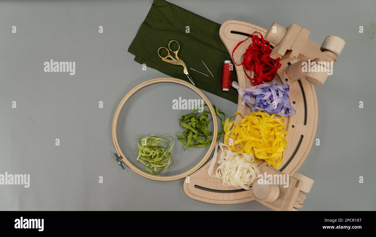 Accessories for ribbon embroidery with silk ribbons with stand hoop for next project. Stock Photo