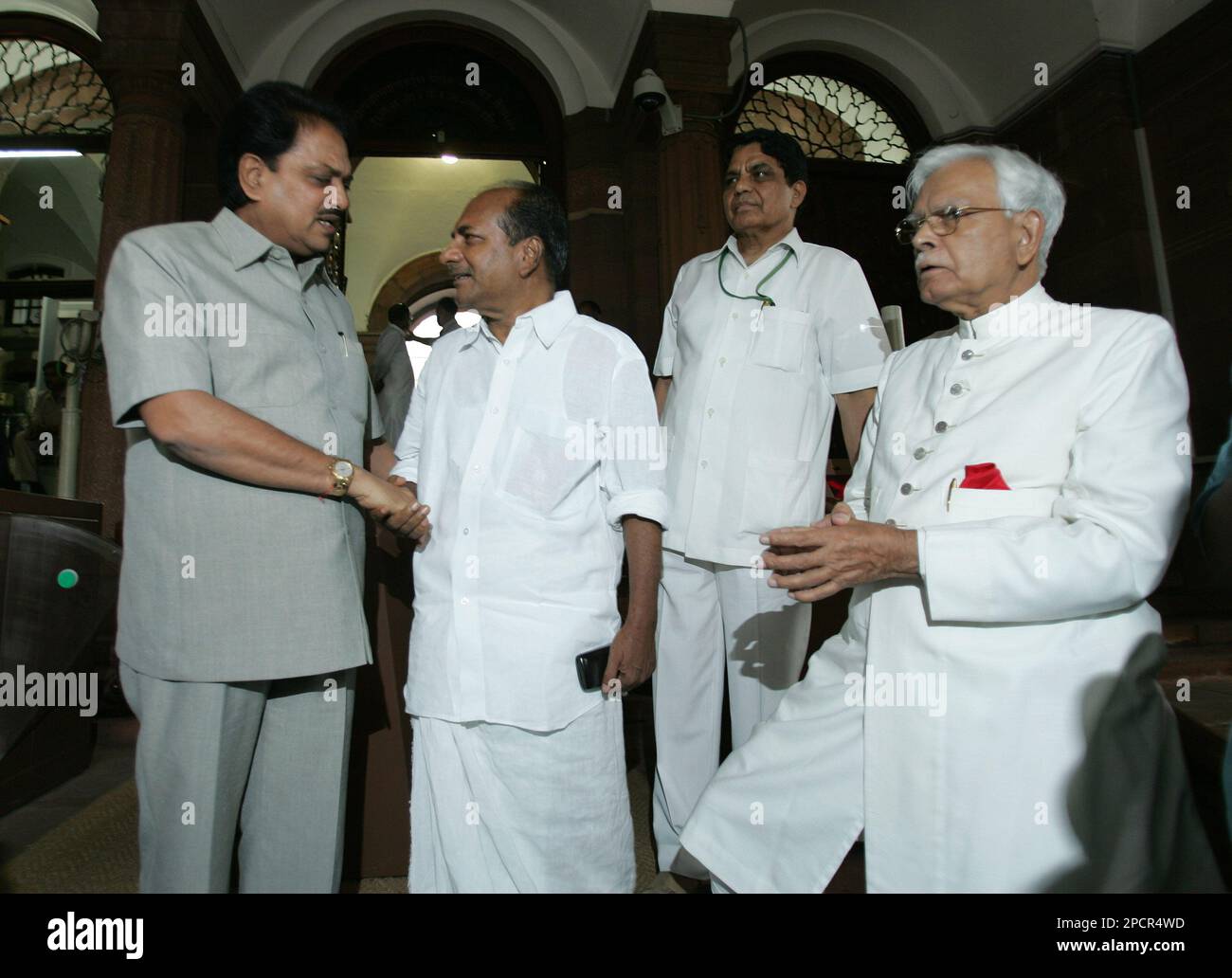 Former Indian Foreign Minister Natwar Singh, right, looks on as ...