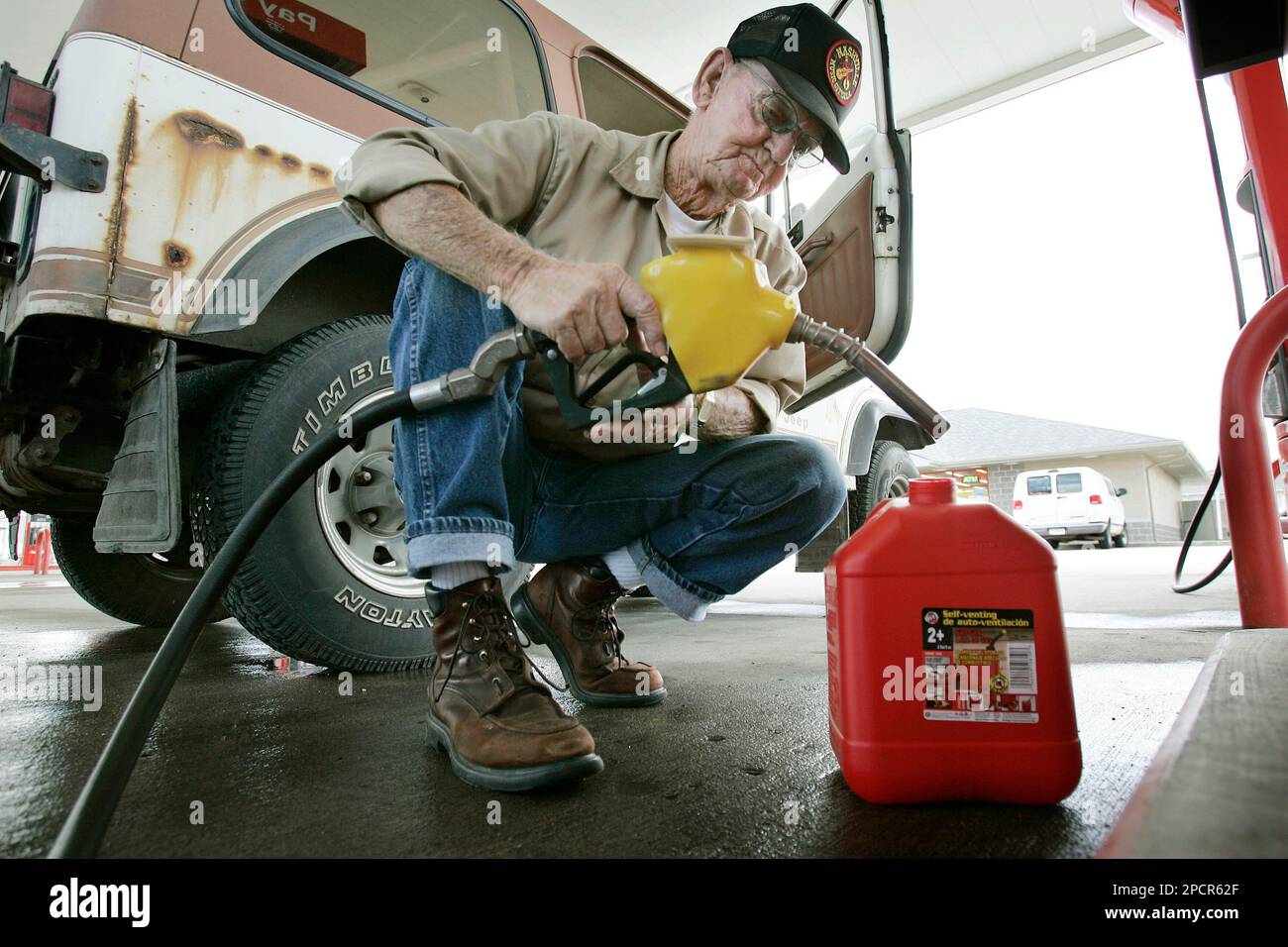 Eugene Hawkins, of Ankeny, Iowa, fills a gas can with E85 fuel at a