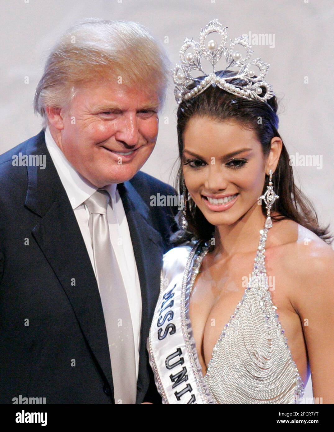 Donald Trump, left, poses with Zuleyka Rivera Mendoza, Miss Puerto Rico 2006, after winning the Miss Universe 2006 pageant on Sunday, July 23, 2006, in Los Angeles. (AP Photo/Mark J. Terrill) Stock Photo