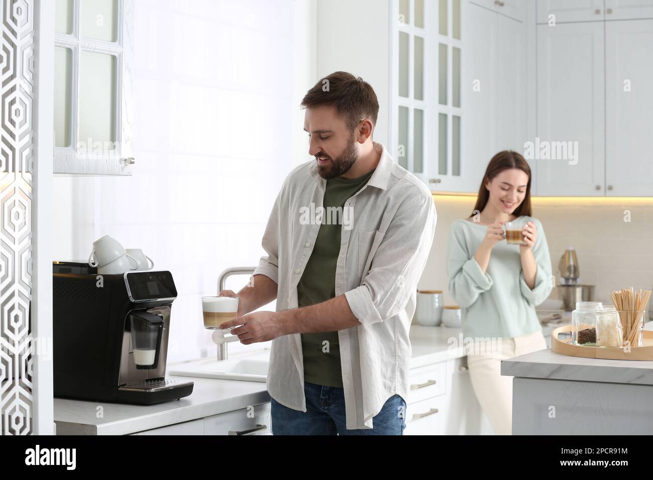 Man using electric coffee hi-res stock photography and images - Alamy