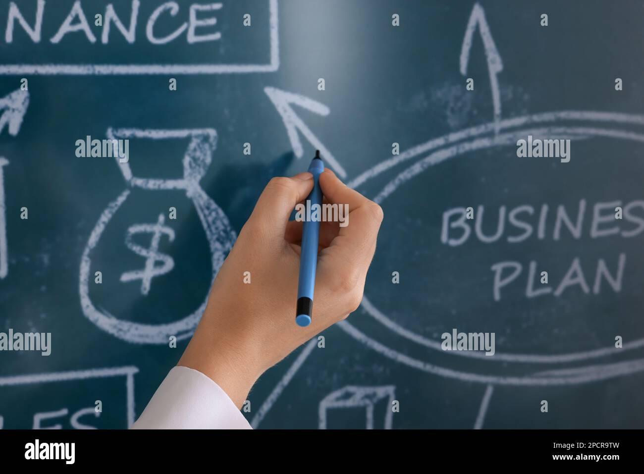 Business trainer with pen using interactive board, closeup Stock Photo