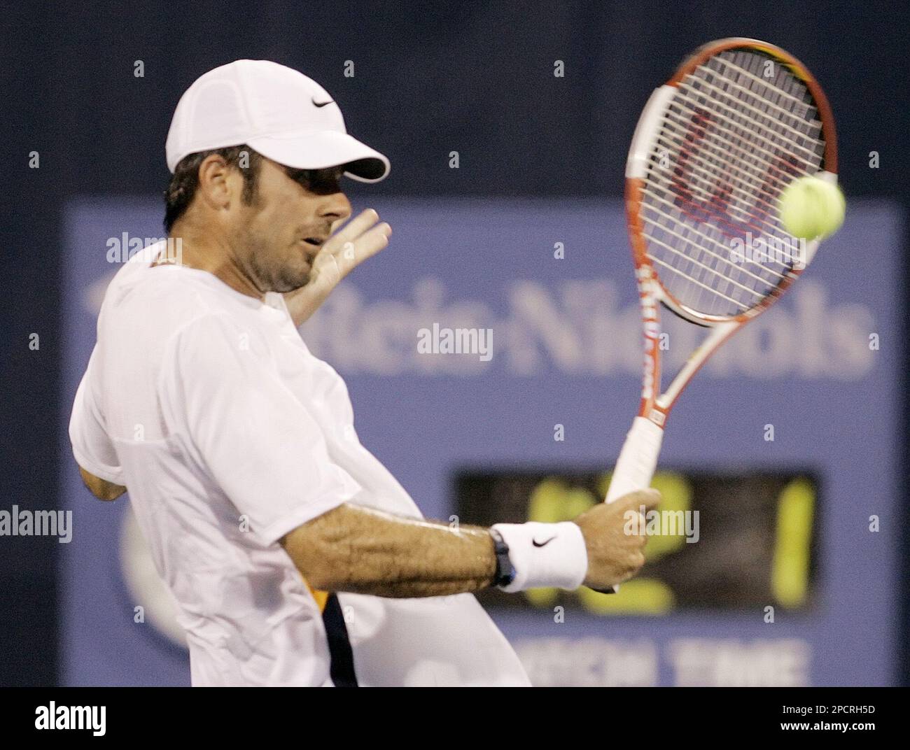 Jeff Morrison of the United States returns a shot against Andy Roddick of  the United States during a third round tennis match at the RCA  Championships in Indianapolis, Thursday, July 20, 2006.Roddick