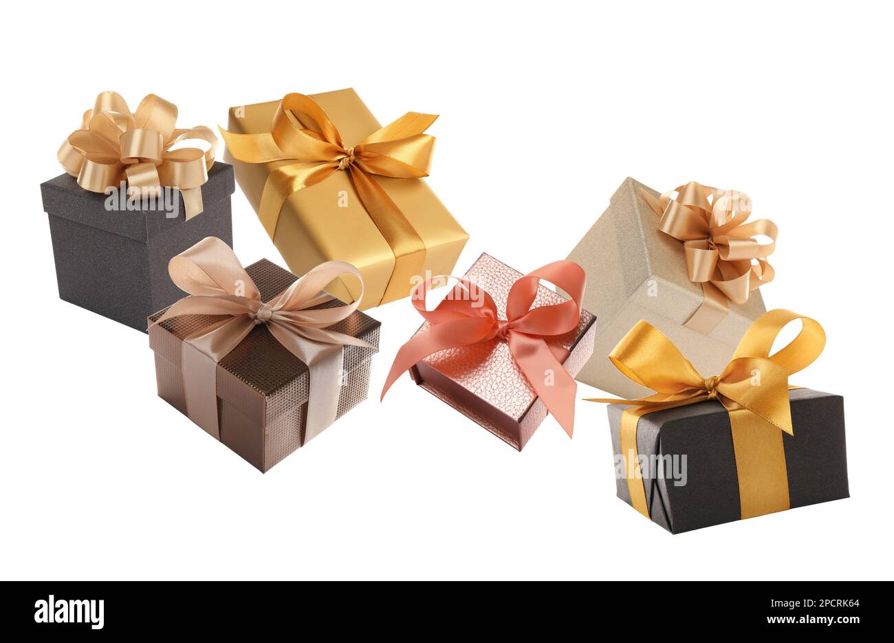 Beautifully wrapped gift boxes flying on white background Stock Photo