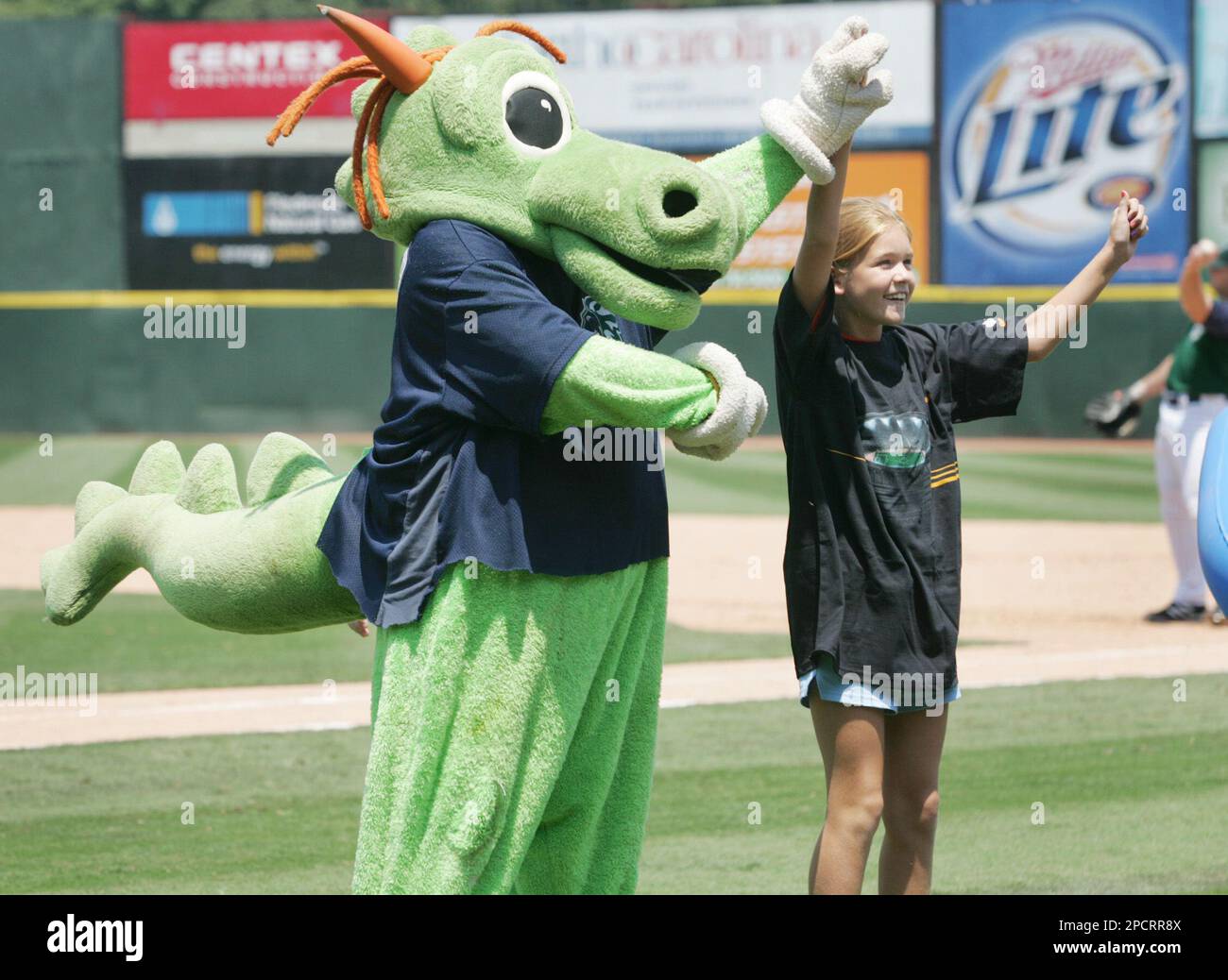Charlotte Knights mascot Homer the Dragon celebrates on the field following  the International League game against the Memphis Redbirds at Truist Field  on April 2, 2023 in Charlotte, North Carolina. (Brian Westerholt/Four