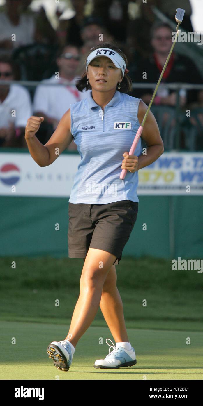 Golfer Mi Hyun Kim of South Korea pumps her fist after sinking the