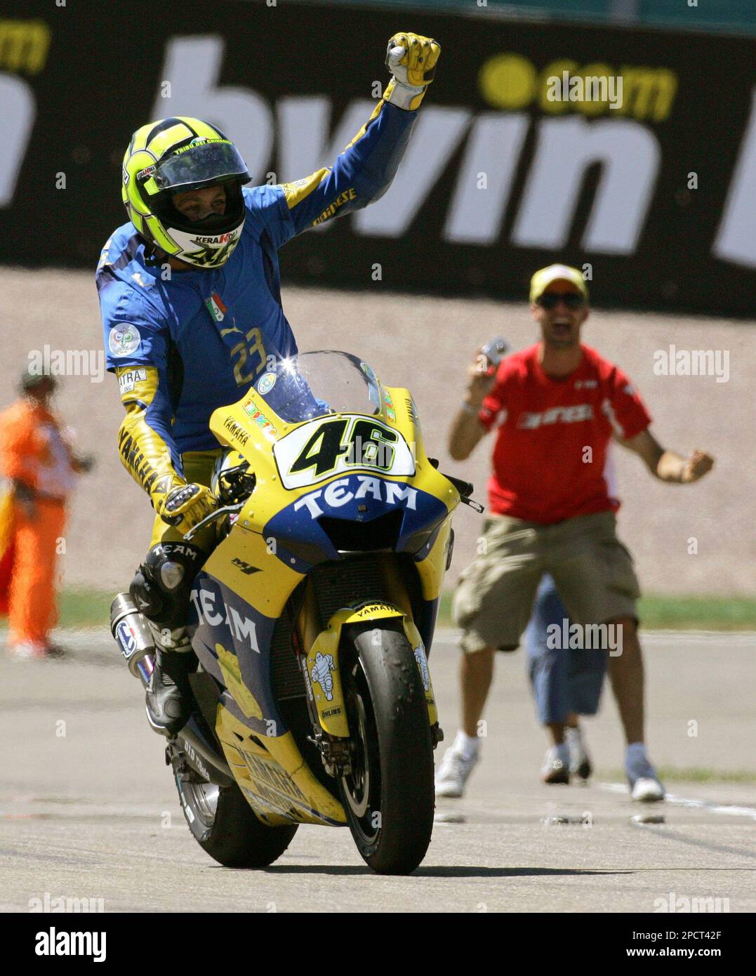 Italys Yamaha rider Valentino Rossi waves to fans after he won the MotoGP race of the Moto Grand Prix of Germany at the Sachsenring circuit in Hohenstein-Ernstthal, eastern Germany, Sunday, July 16,