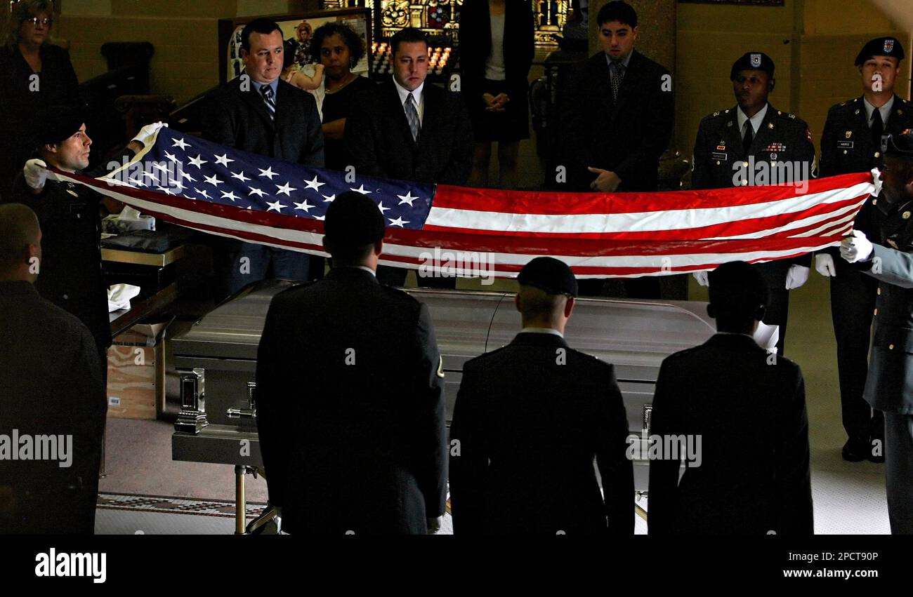 Second Lt. Sean Kitchen, left, and the rest of the National Guard