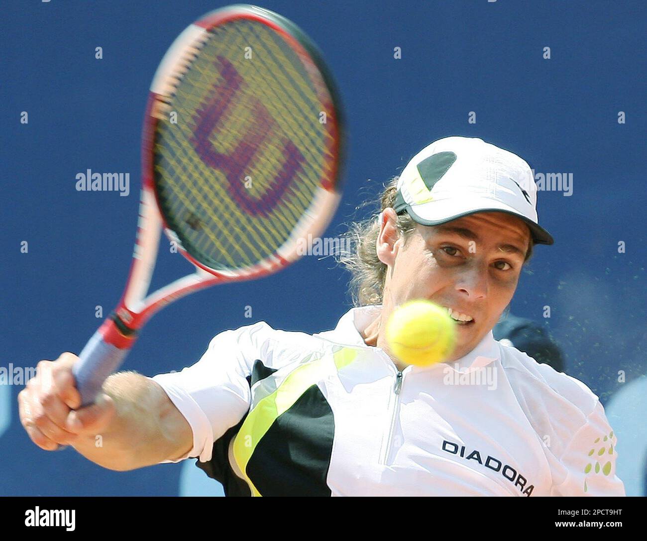 Gaston Gaudio from Argentina returns a ball to Richard Gasquet from