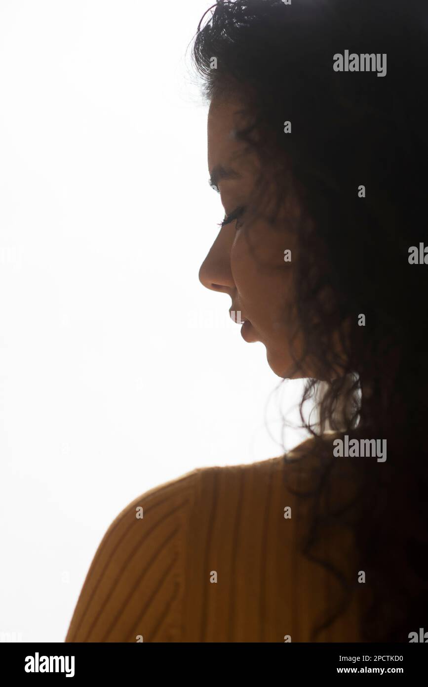 Profile of a Sad Young Woman Silhouette in Swimsuit Stock Image