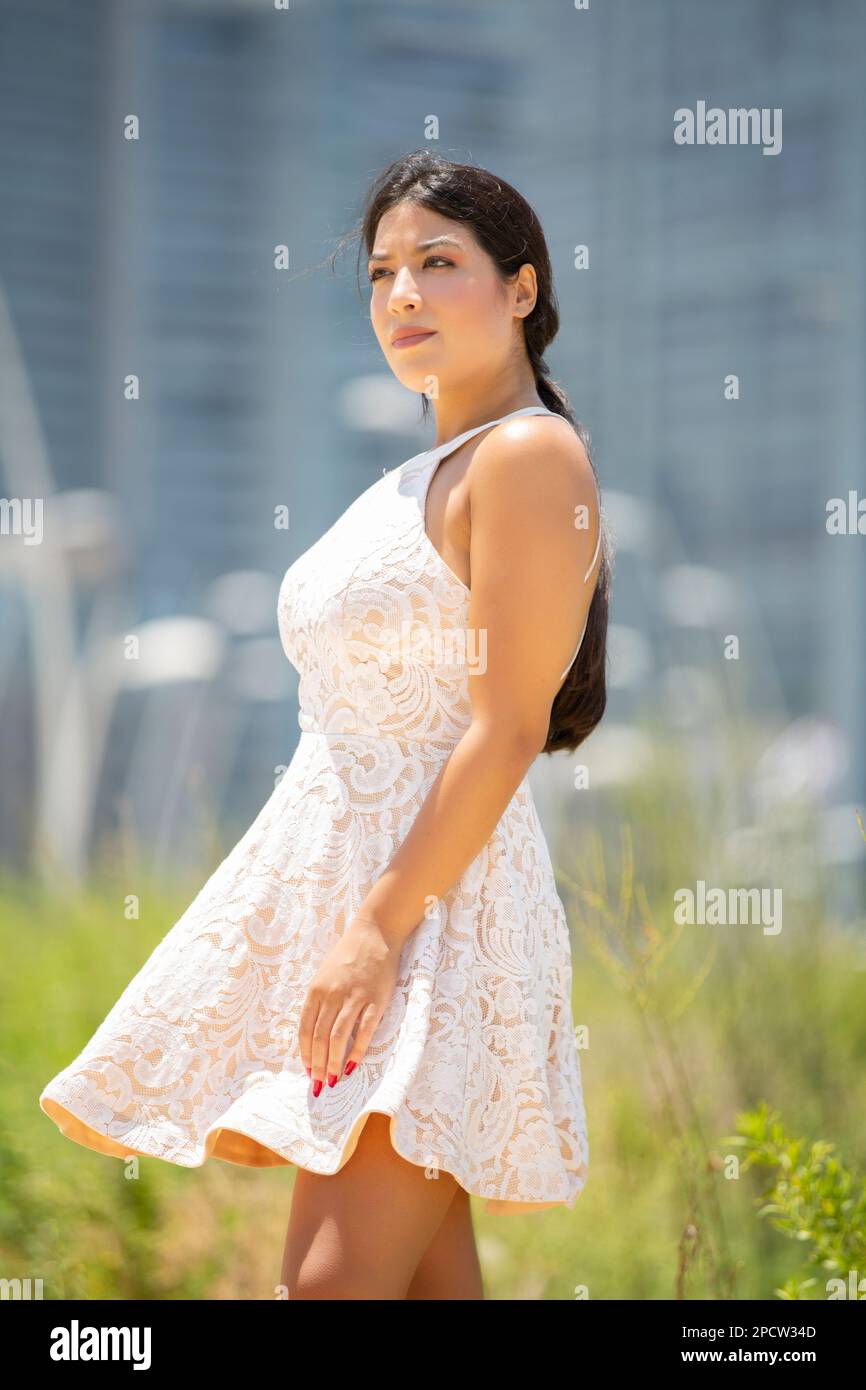Beautiful latina woman in white hi-res stock photography and images - Alamy