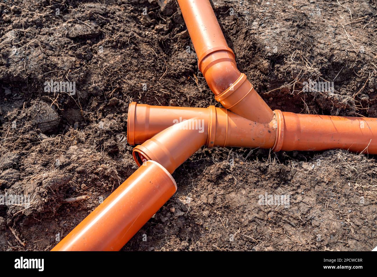 plastic waste pipes in the ground Stock Photo Alamy