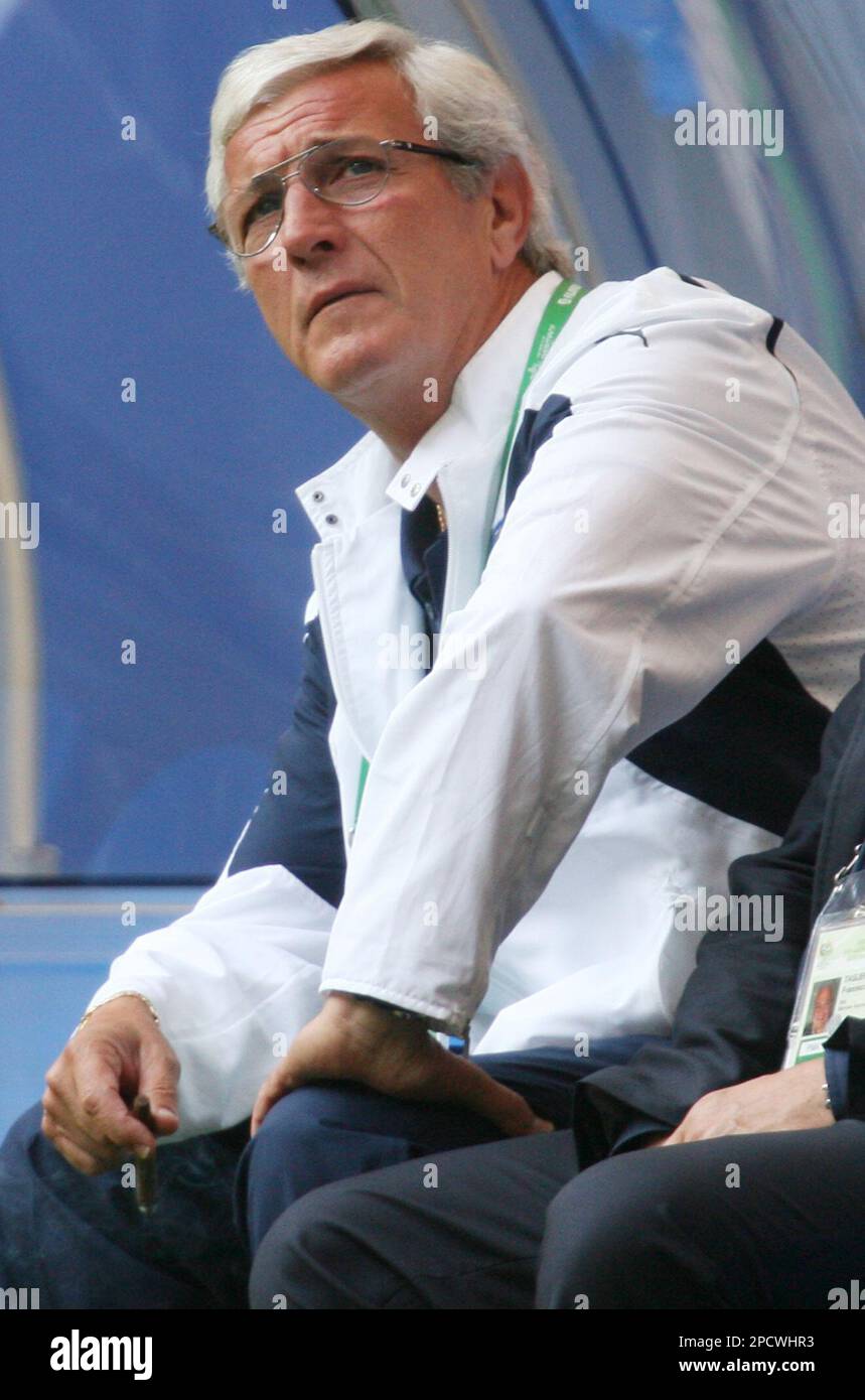 Italian coach Marcello Lippi sits on the bench prior to the Italy vs ...