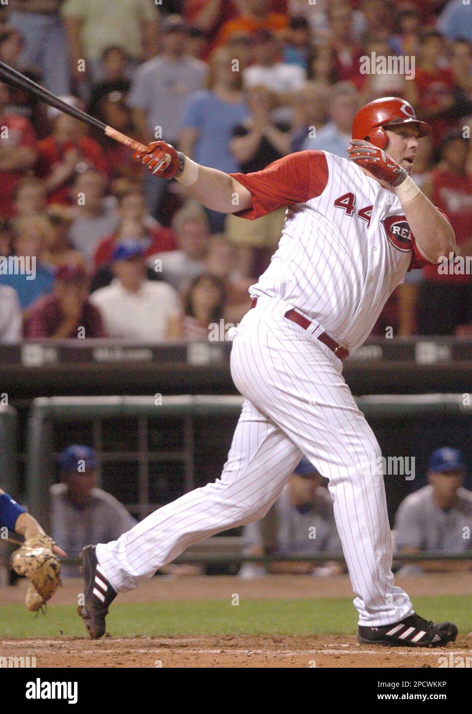 Cincinnati Reds' Adam Dunn watches his goahead double off Kansas City