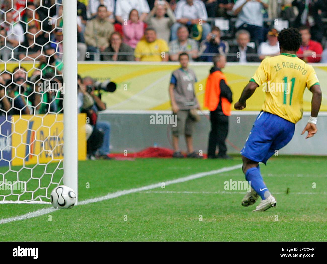 brazils-ze-roberto-scores-his-teams-third-goal-during-the-world-cup-round-of-16-soccer-match-between-brazil-and-ghana-at-the-dortmund-stadium-germany-tuesday-june-27-2006-brazil-won-3-0-ap-photomark-j-terrill-mobilepda-usage-out-2PCX0AR.jpg