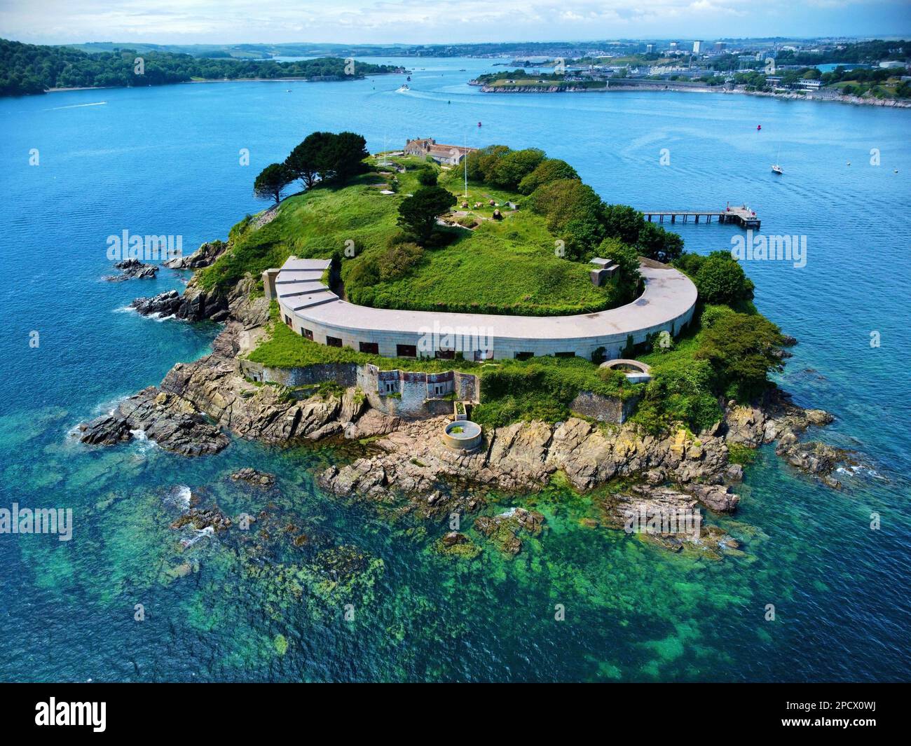 an Aerial view of Plymouth England's Drake's Island featuring coastline and harbor Stock Photo