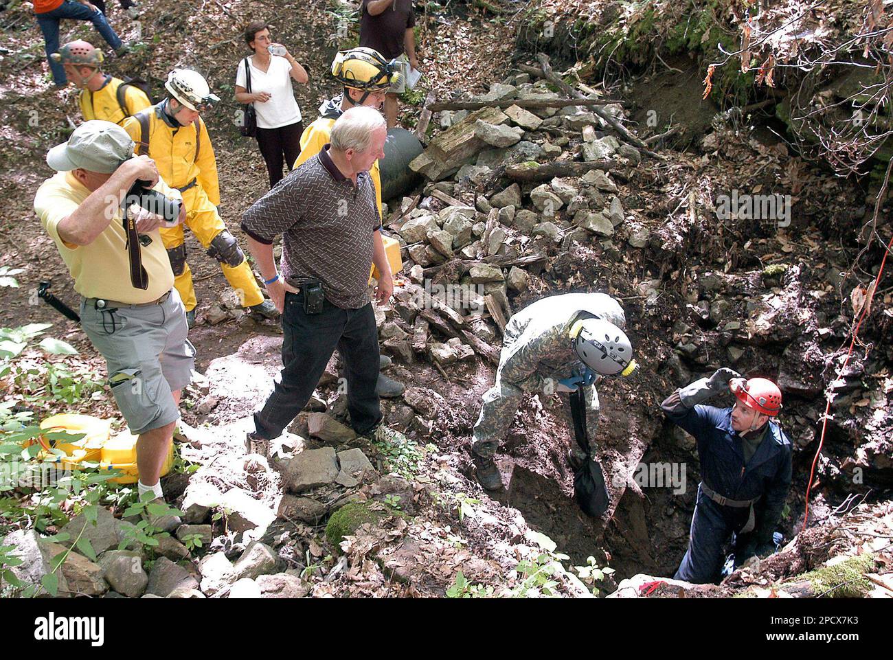 A recovery team prepares to enter Schroeder's Pants Cave in Dolgeville