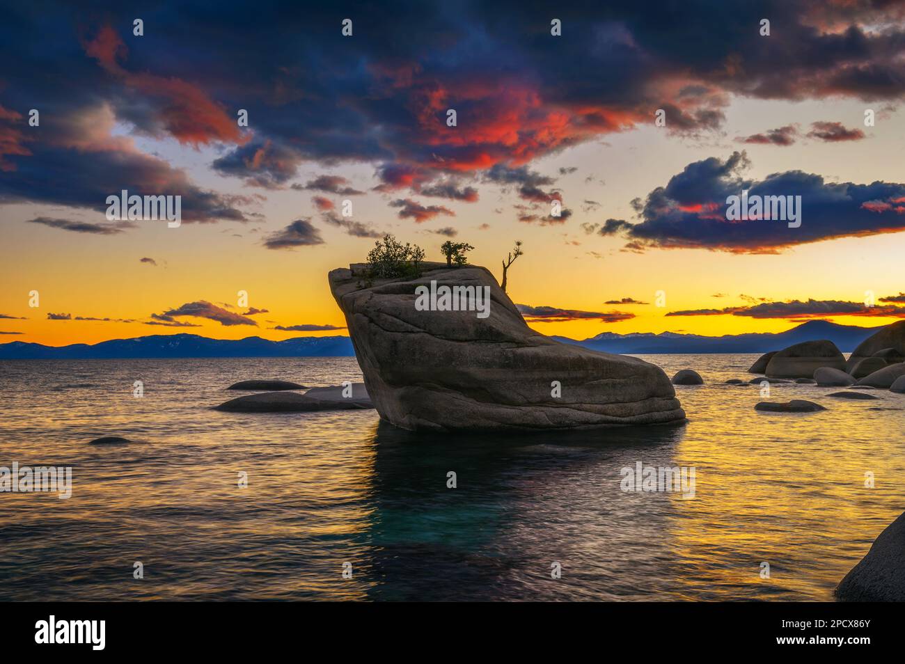 Dramatic sunset over the Bonsai Rock of Lake Tahoe, Nevada Stock Photo