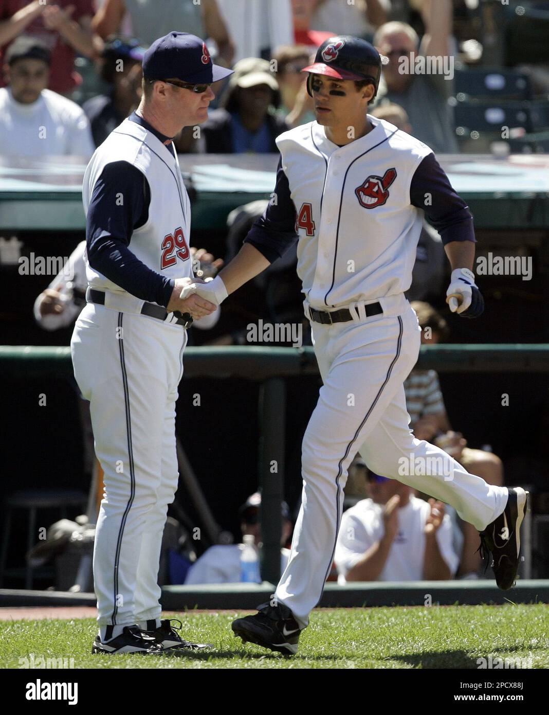 Cleveland Indians' Grady Sizemore, right, is congratulated by