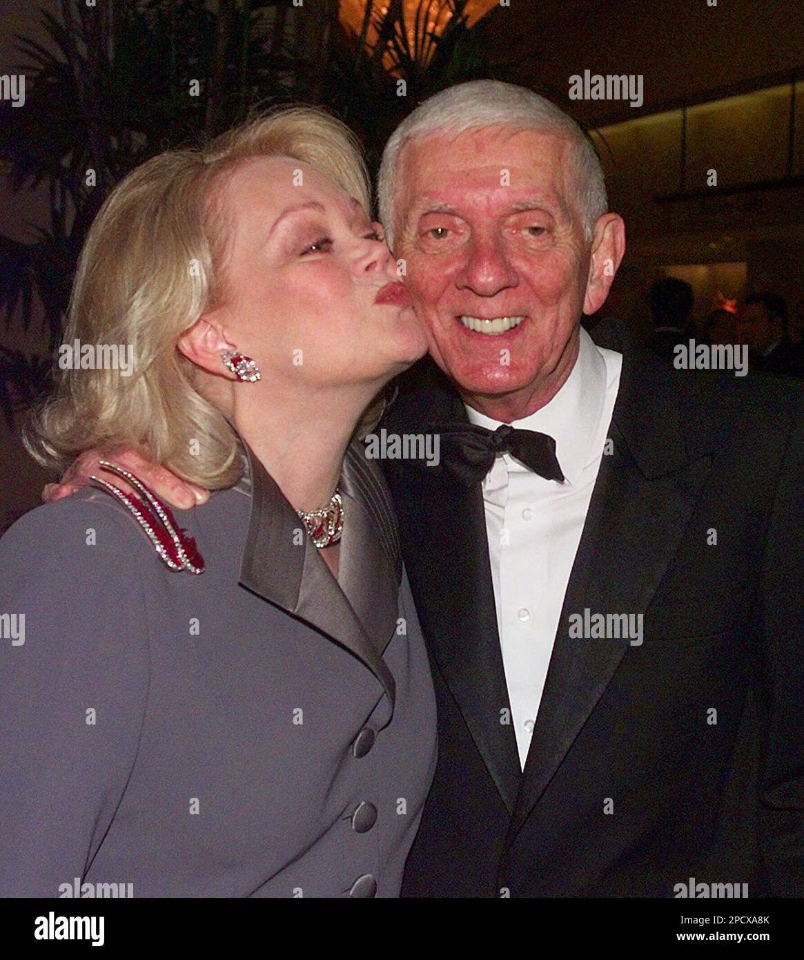 FILE Aaron Spelling Receives A Kiss From His Wife Candy Prior To file aaron spelling receives a kiss from his wife candy prior to