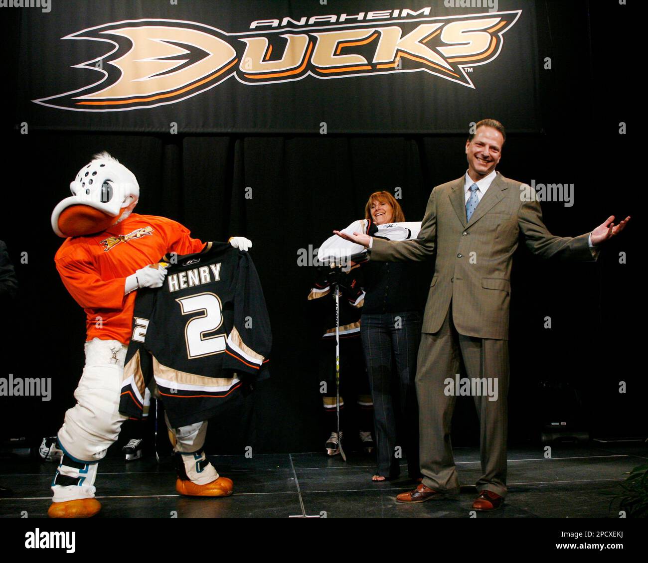 Team mascot Wild Wing points at Anaheim Ducks owners Susan