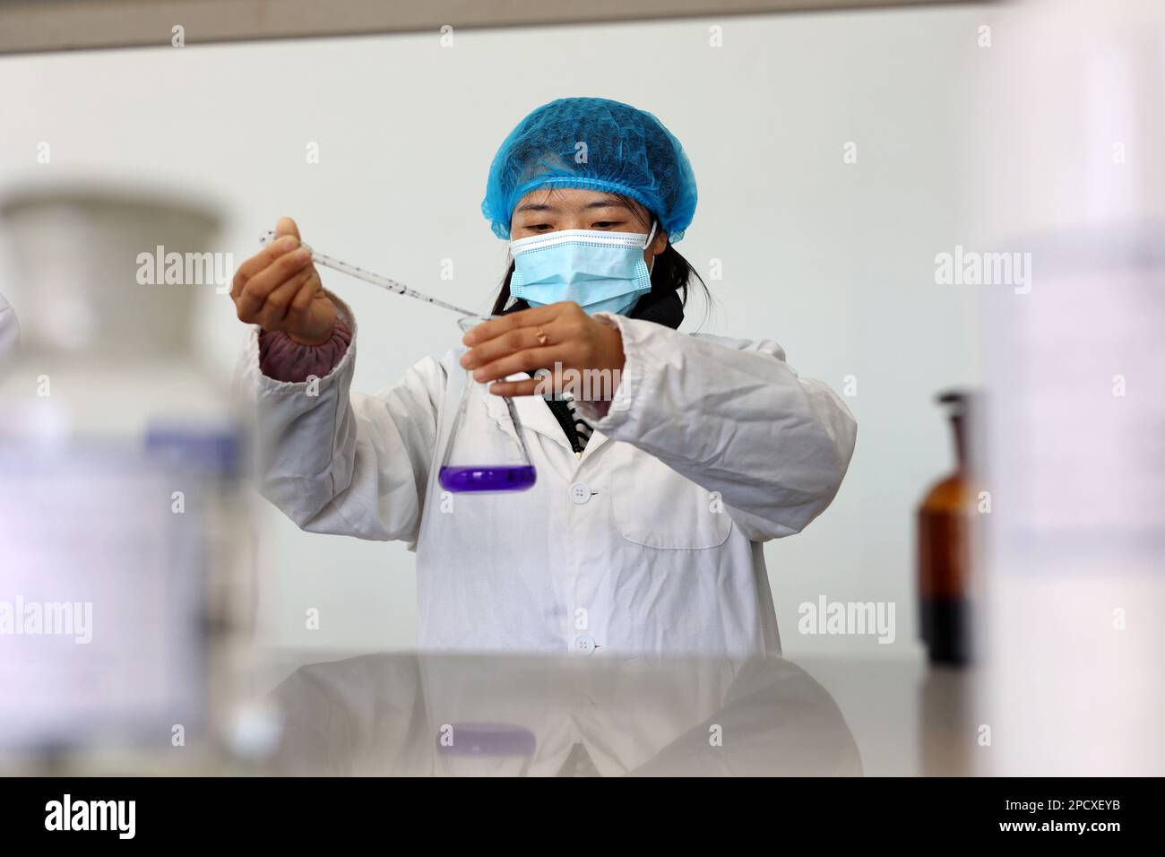 BINZHOU, CHINA - MARCH 14, 2023 - A researcher arranges indicator liquid in the physicochemical room of a biotechnology manufacturer in Binzhou, East Stock Photo