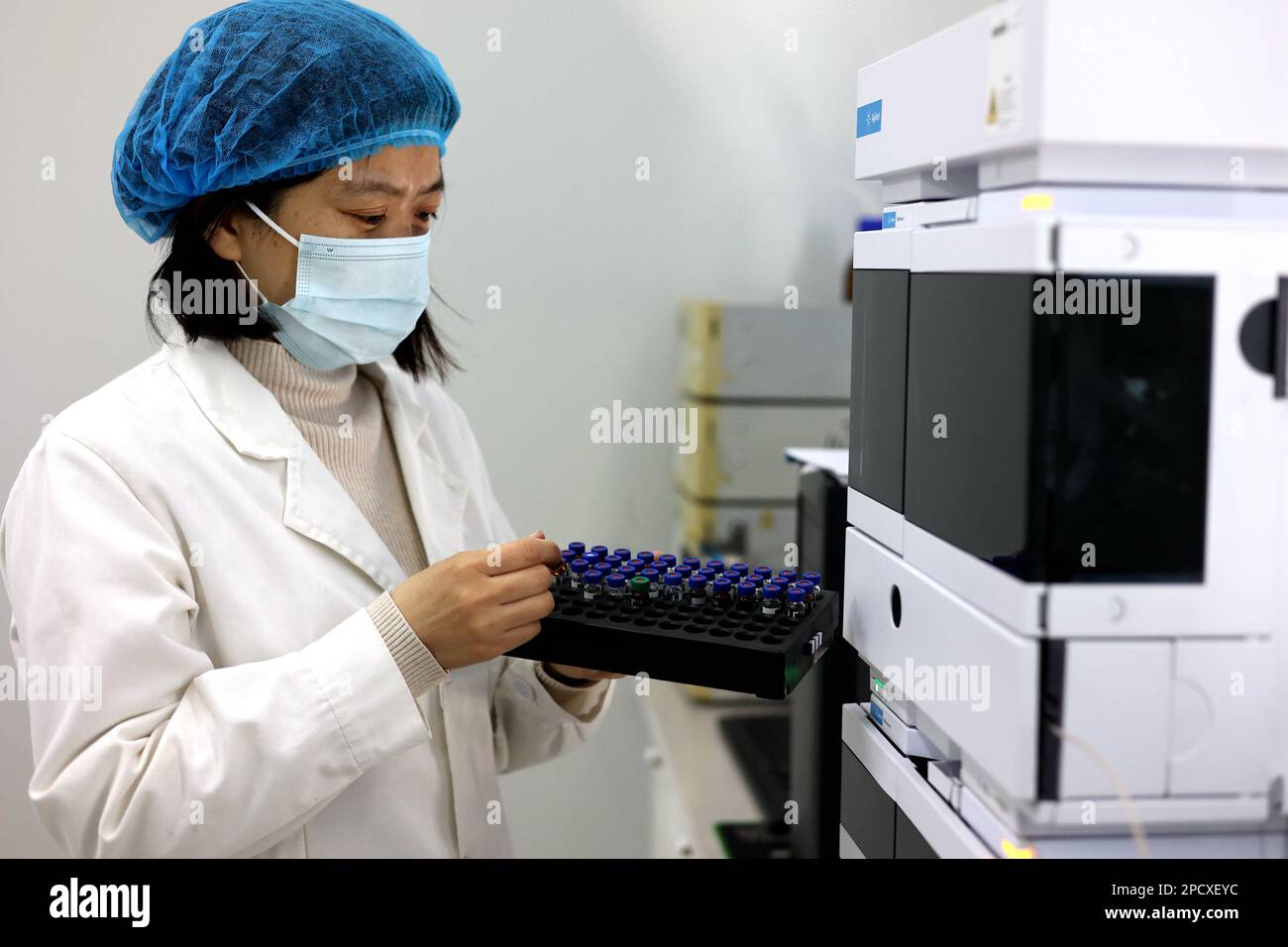 BINZHOU, CHINA - MARCH 14, 2023 - A researcher tests the content of Chinese veterinary drugs in the precision instrument room of a biotechnology manuf Stock Photo
