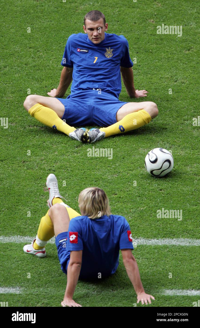 Andriy Shevchenko, top, and Maksym Kalynychenko of the Ukraine soccer