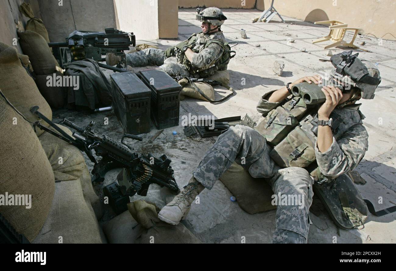 U.S. Army soldiers keep a watch for suspicious activity from