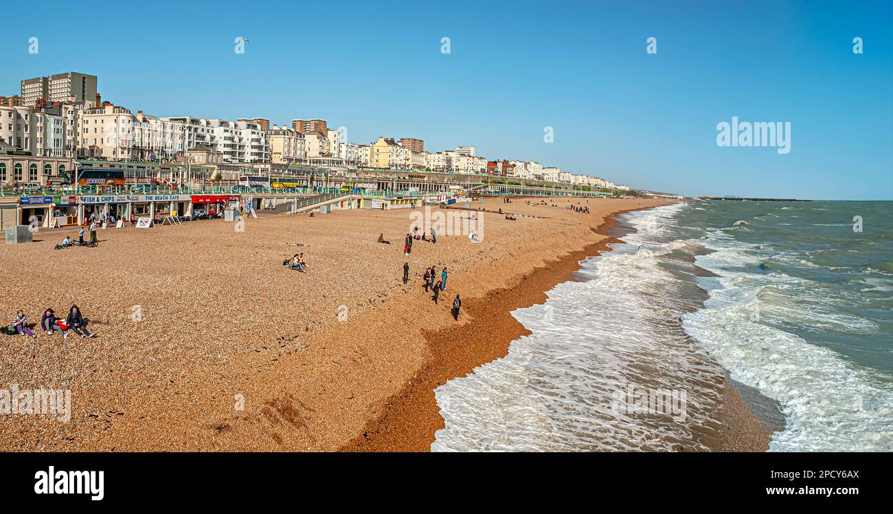 View along Brighton Beach, East Sussex South England Stock Photo - Alamy