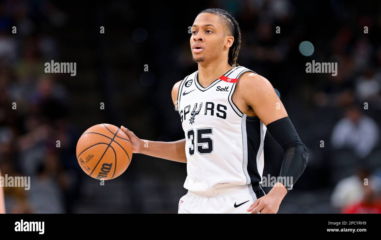 San Antonio Spurs' Romeo Langford runs up the court during the