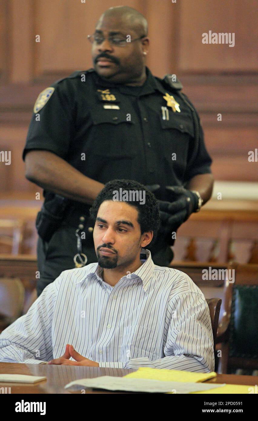 Esteban Carpio sits in Superior Court in Providence, R.I., Wednesday, June 7, 2006, during jury