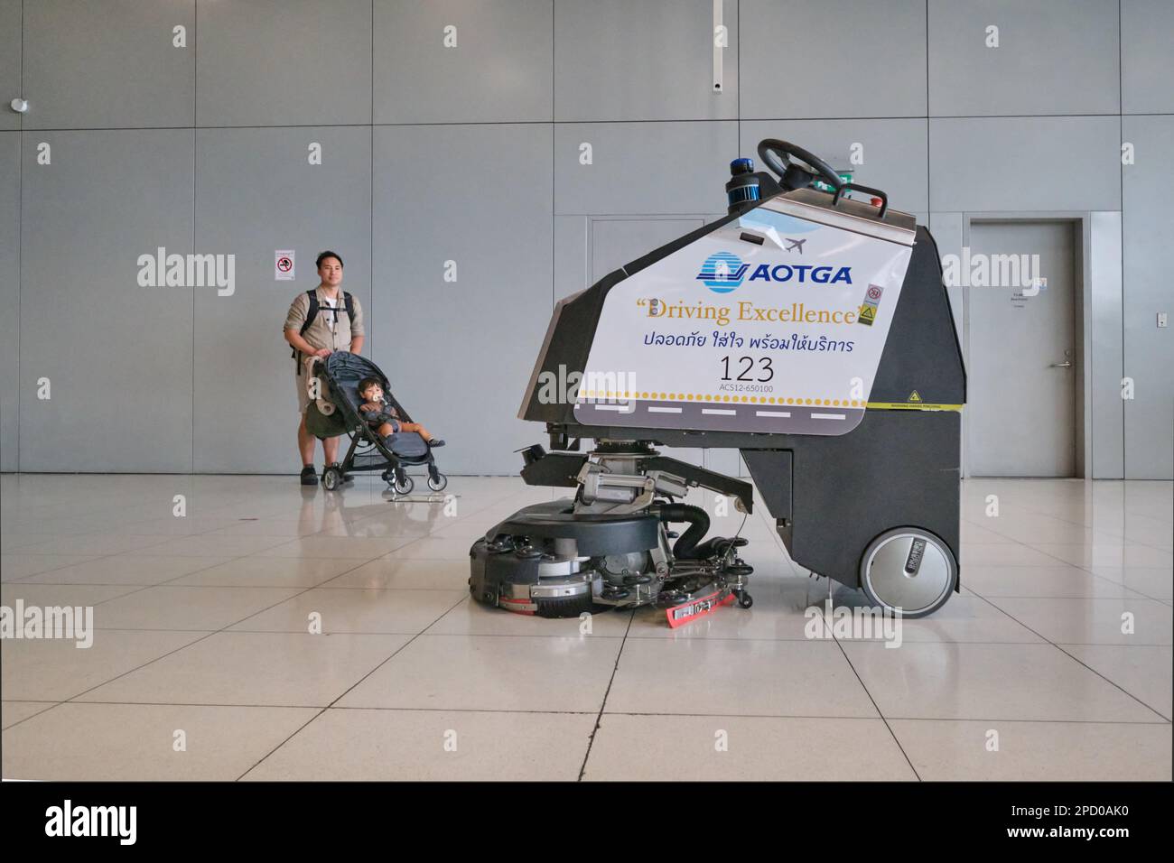 A cleaning robot cleans the luggage retrieval area in of Suvarnabhumi