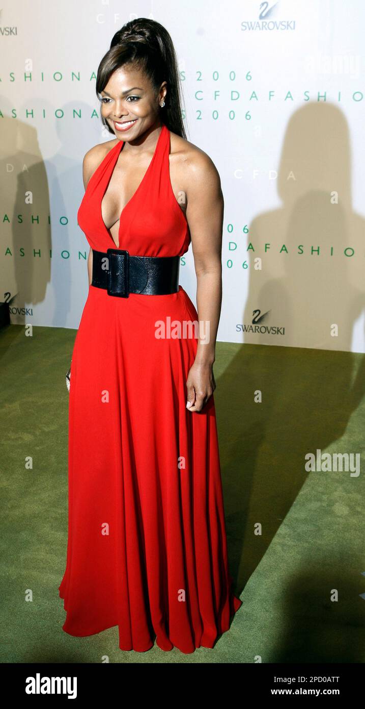 janet jackson red dress Janet Jackson Red Floral Sleeveless Dress