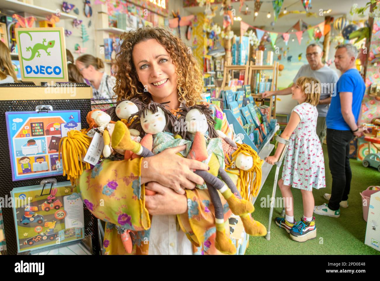 The My Small World toy shop owner Dawn Burden in Bath, UK Stock Photo