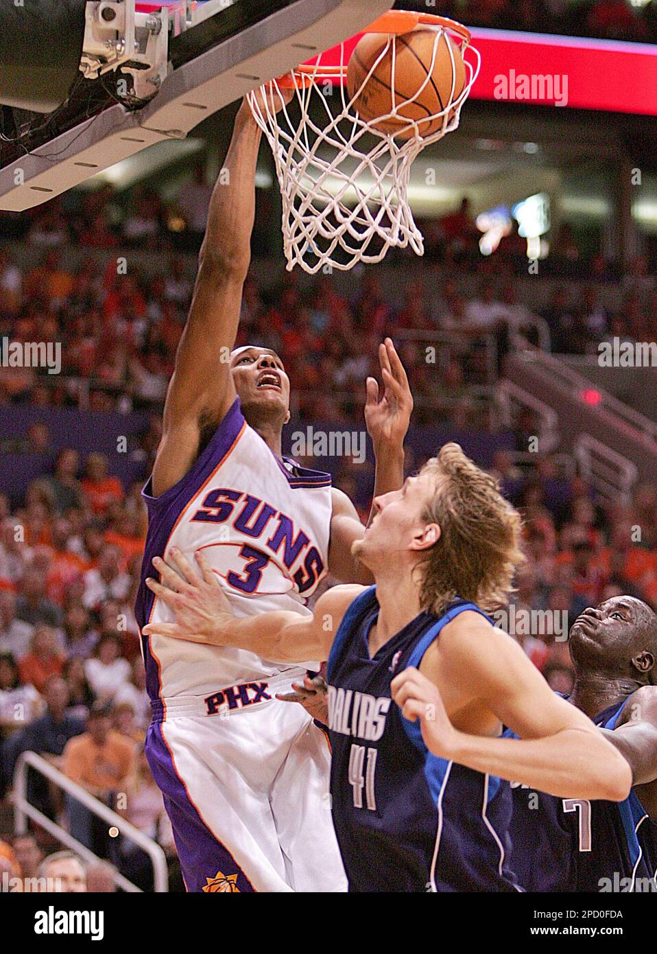 Phoenix Suns' Boris Diaw (3) of France, dunks over Dallas Mavericks Dirk  Nowitzki, of Germany, during the second quarter of Game 6 during the NBA  Western Conference Finals basketball series Saturday, June