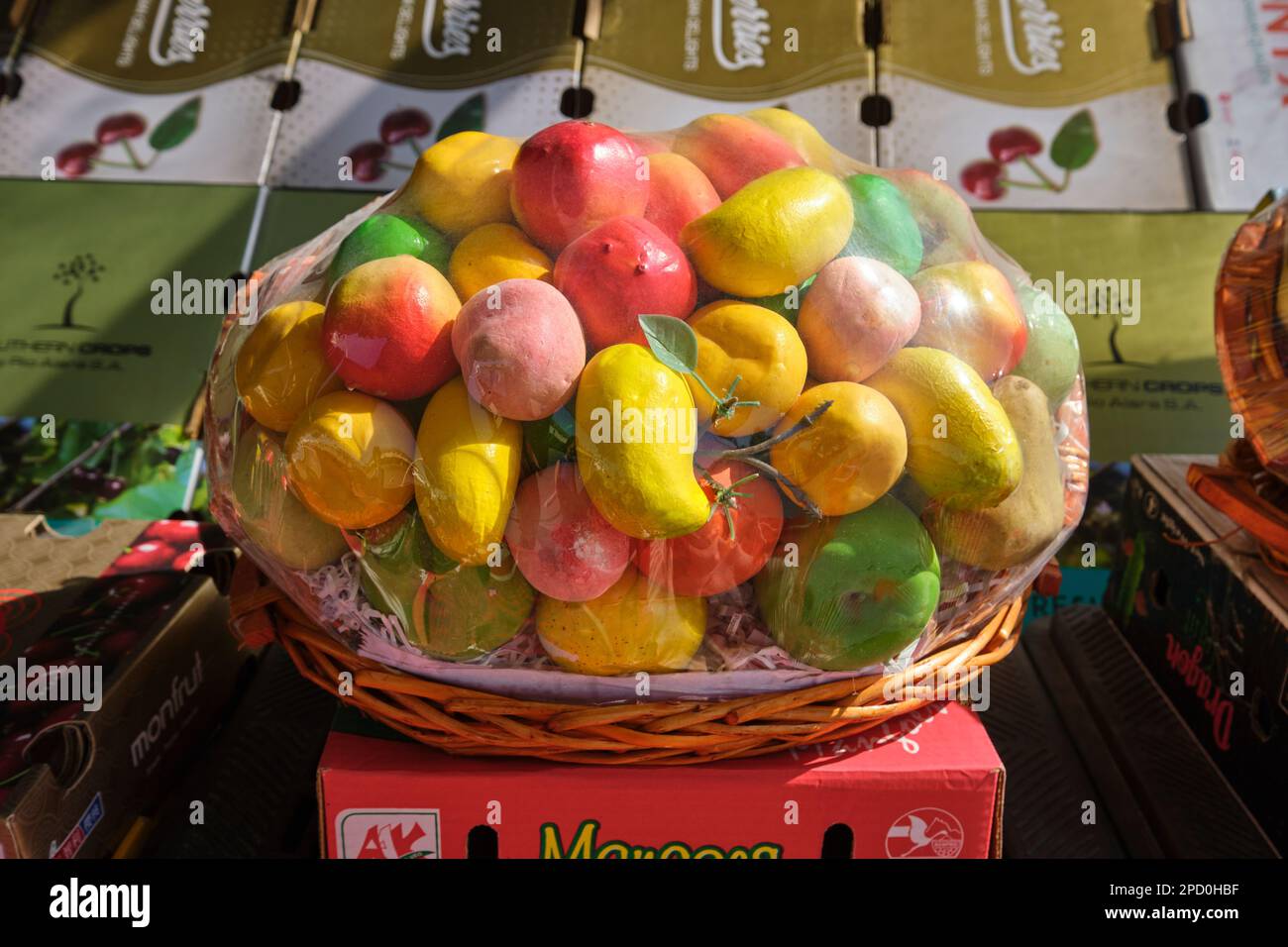A sample fruit basket, made of fake, plastic pieces. At the local fruit