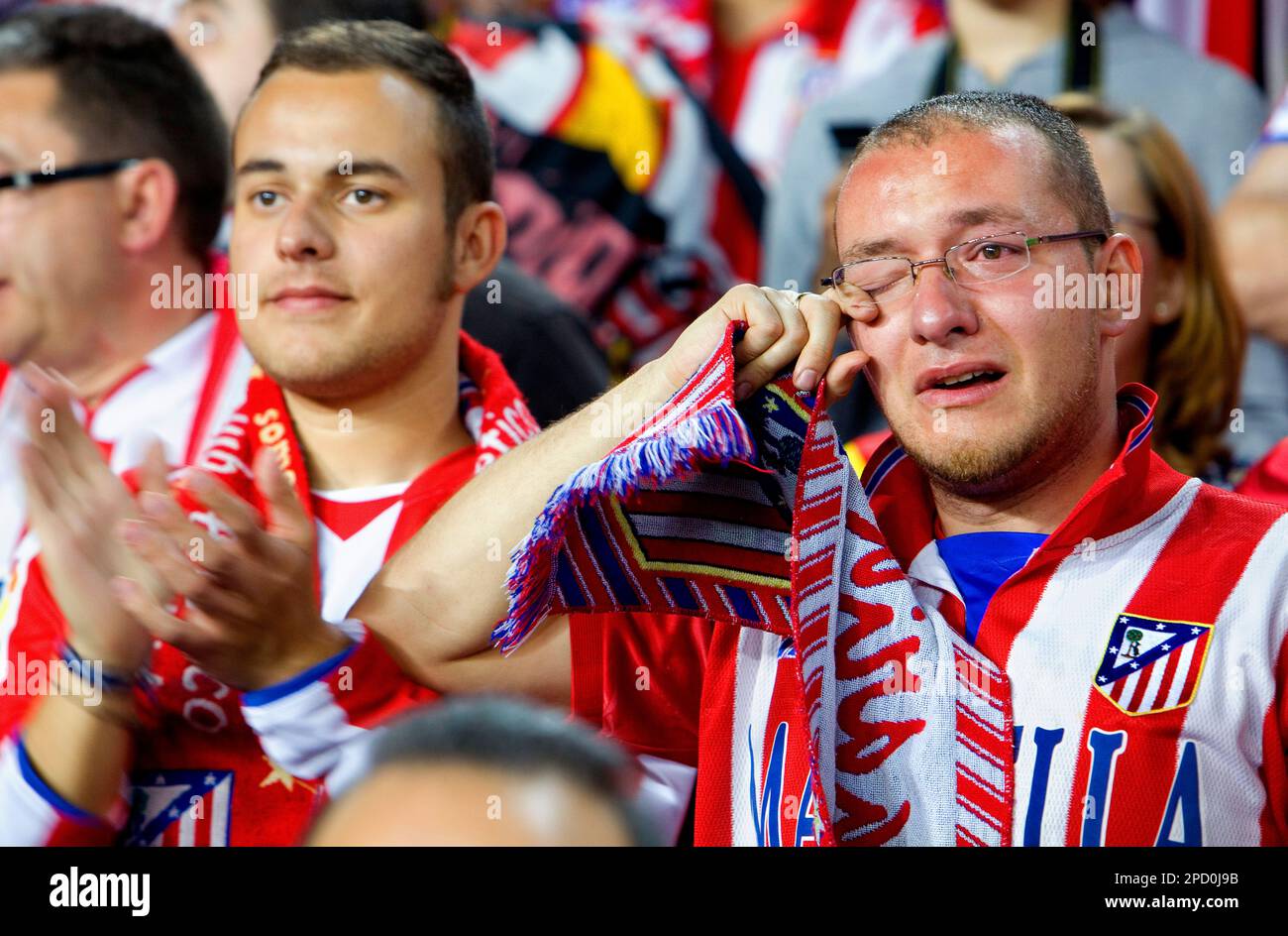 Fan crying.Atlético de Madrid football fans.Fútbol Club Barcelona