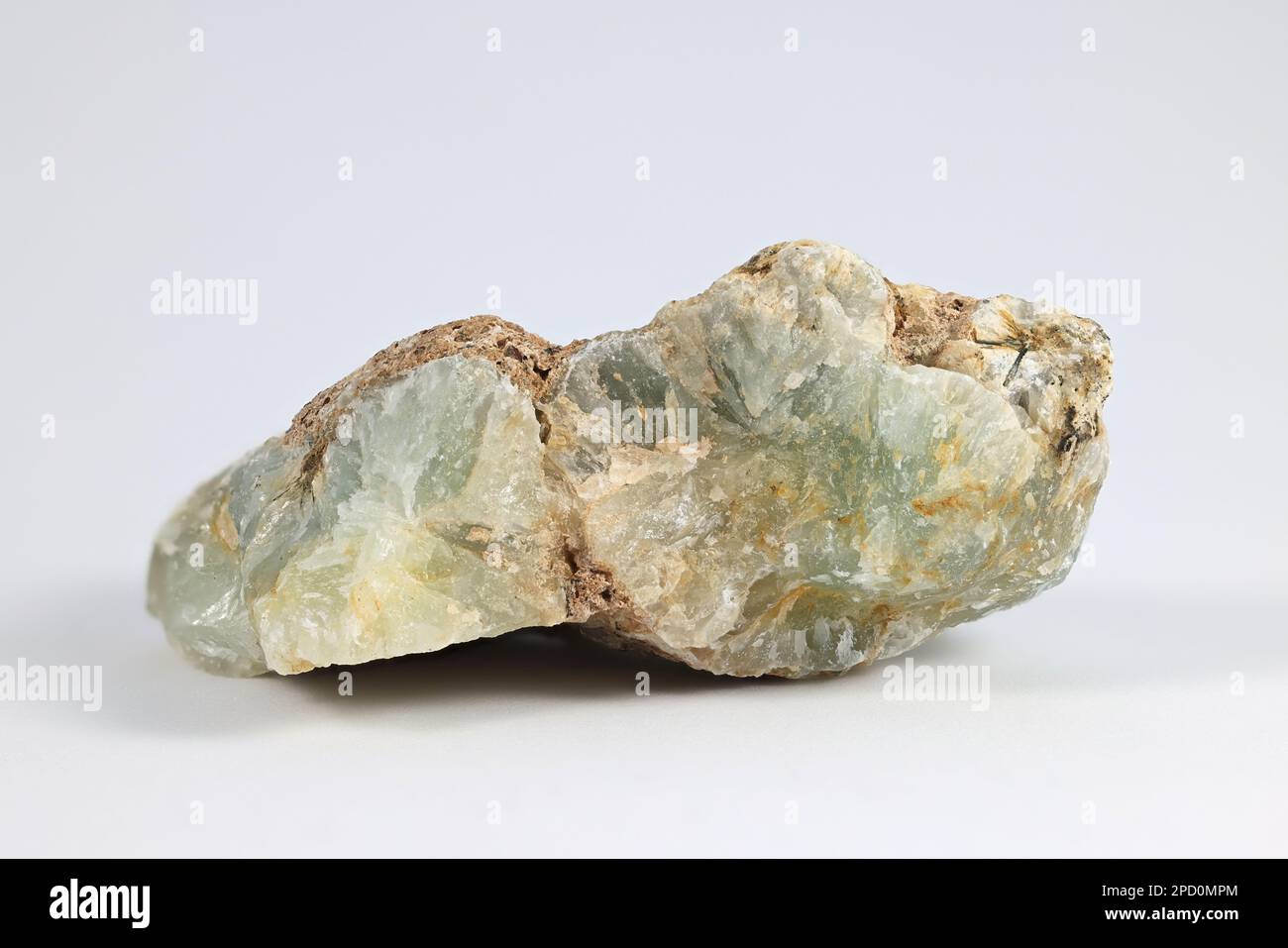 Prehnite is a greenish and hard silicate mineral that is popular as cabochon material Stock Photo