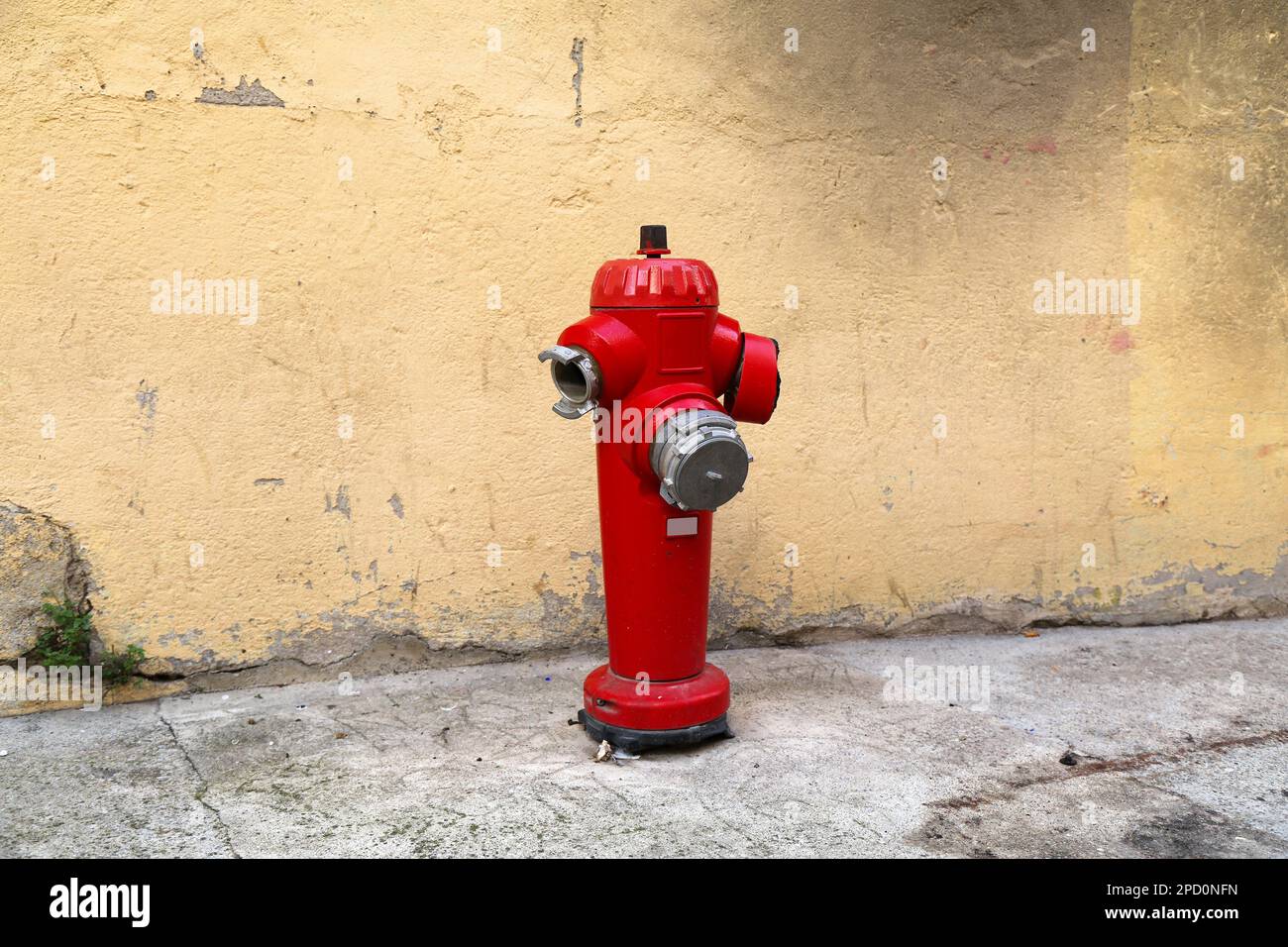 Fire hydrant in Perpignan, France. Red standpipe. Fire safety